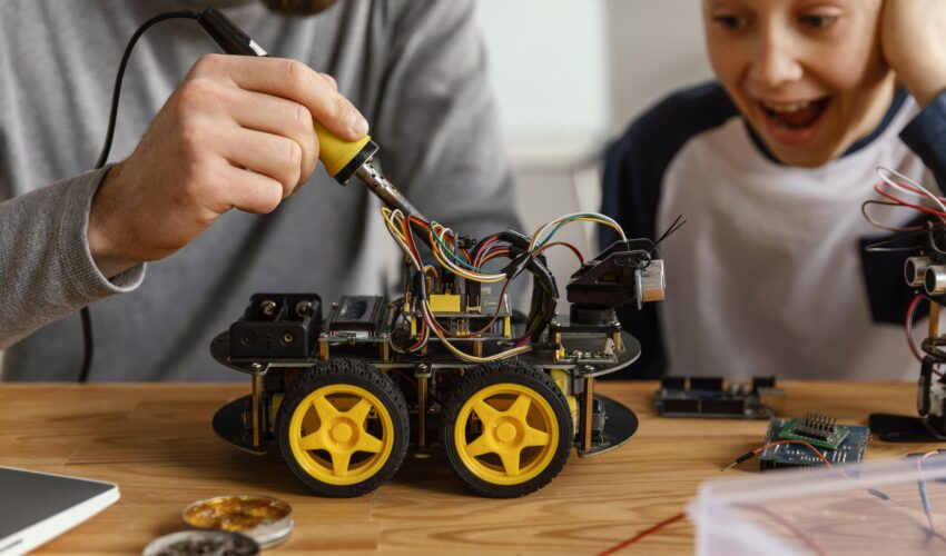 father son making robot Saravati